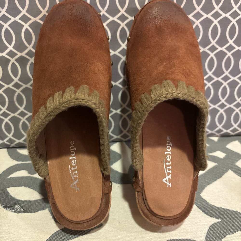 Brown suede clogs